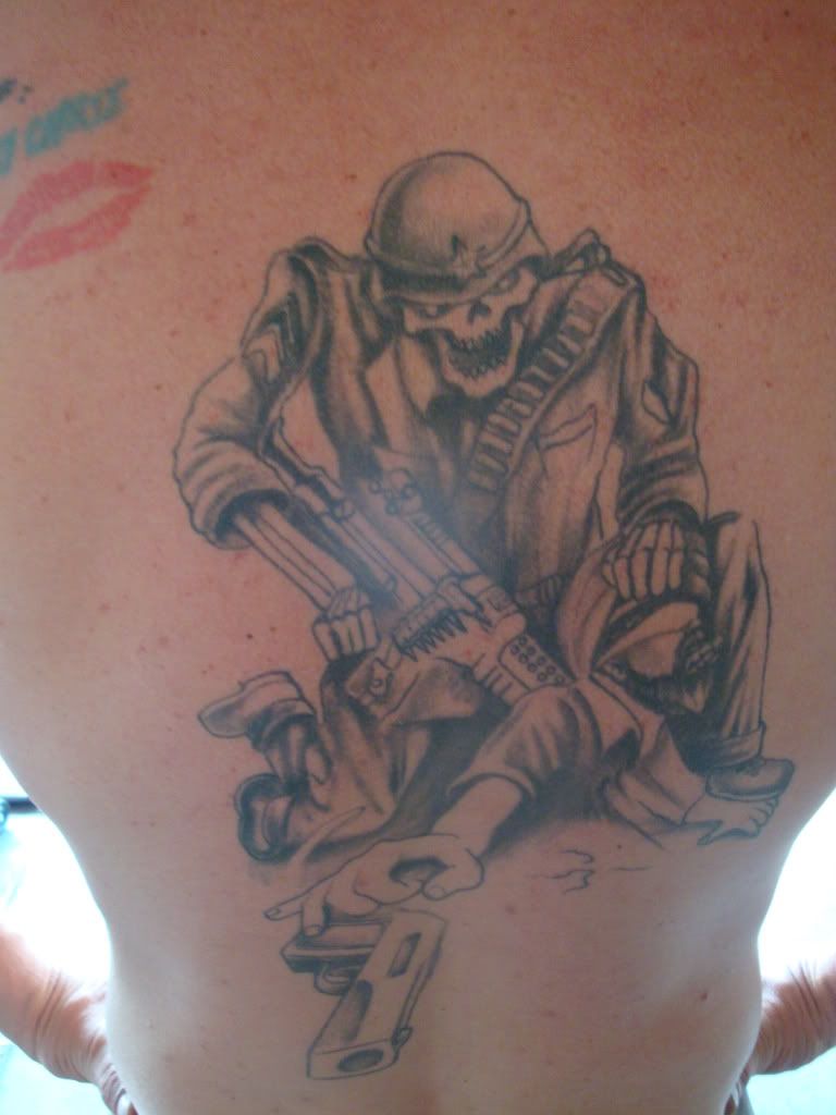 Anyone Have Any Gun Tattoos