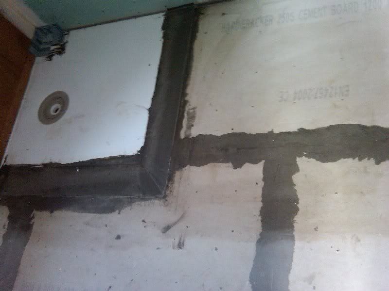 Impey shower tray fitted flush with Wayrock... > Tiling Advice Tilers