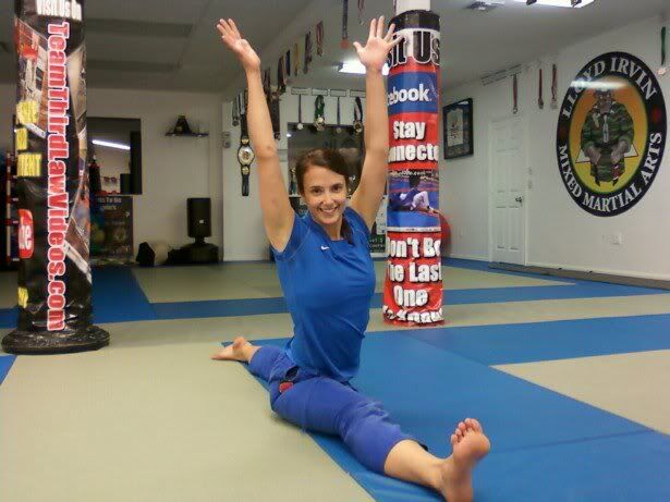 Yoga students work on split flexibility at Third Law in Naples, FL Yoga students work on split flexibility at Third Law in Naples, FL