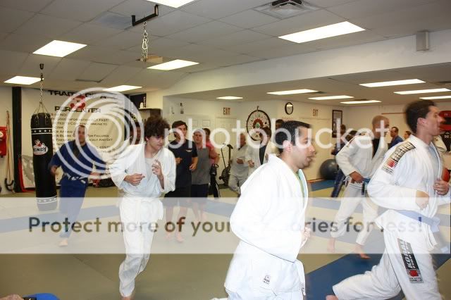 Students warm up at Third Law's first BJJ Beginner Boot Camp Seminar